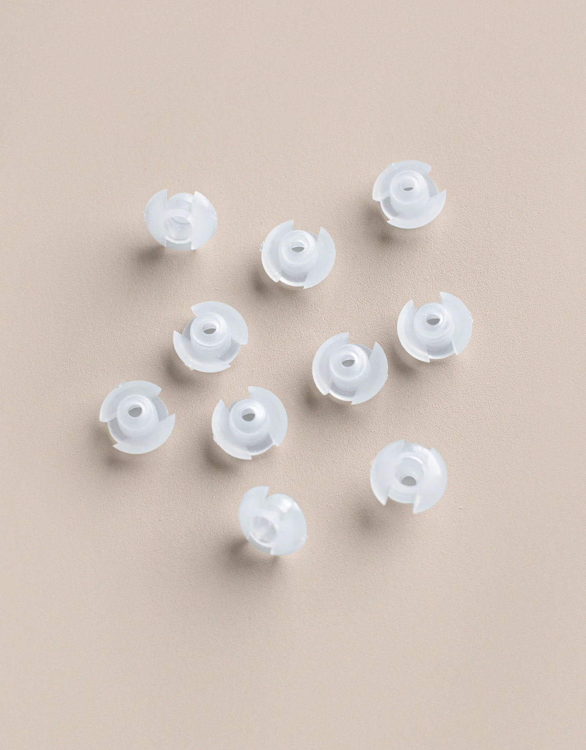 10-pack bottenknappar till mellanglaspersienn