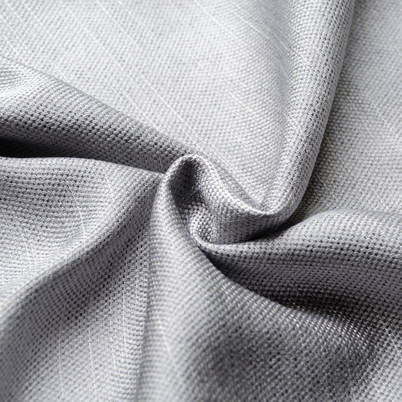 Grått gardintyg med viss struktur och glans