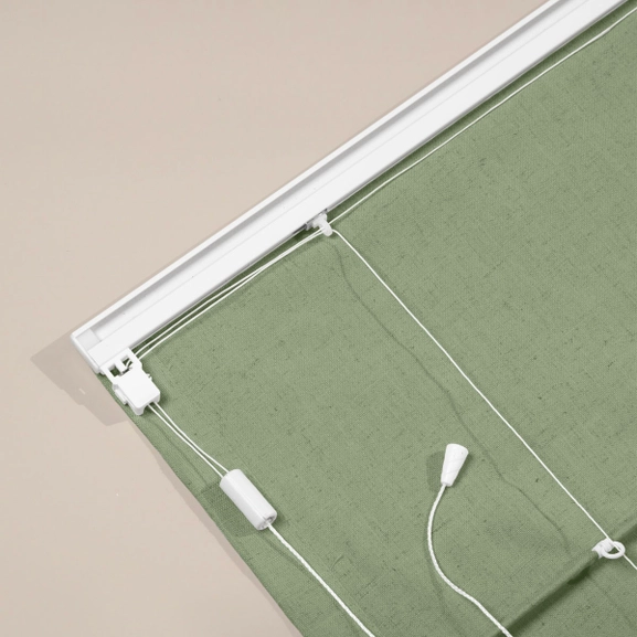 Baksidan av en grön hissgardin med linlås