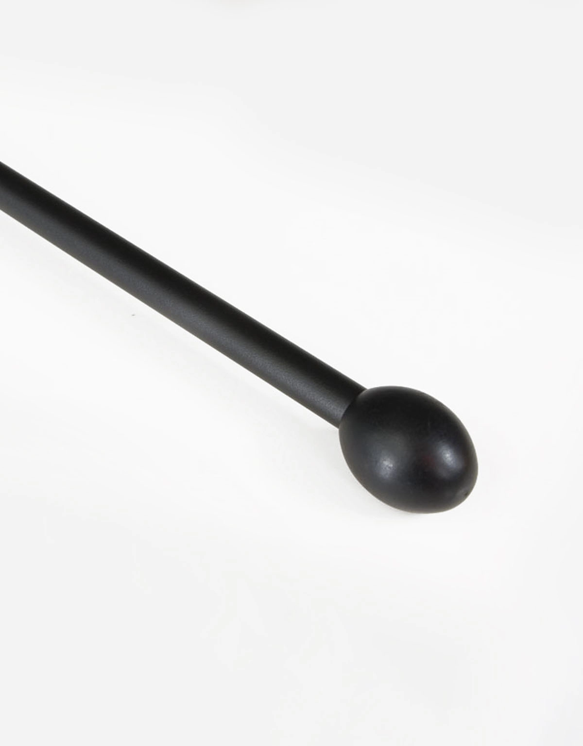 Svart gardinstång med oval knopp