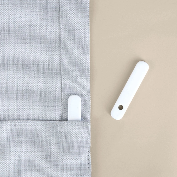 Gardintyngd i fållen på en gardin