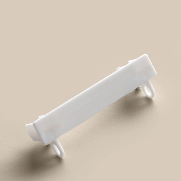 Ändbeslag till hotellskena