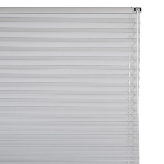 Närbild på mörkläggande plisségardin