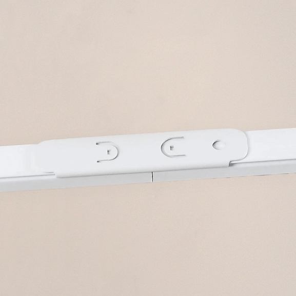 Vit skarv till gardinskena