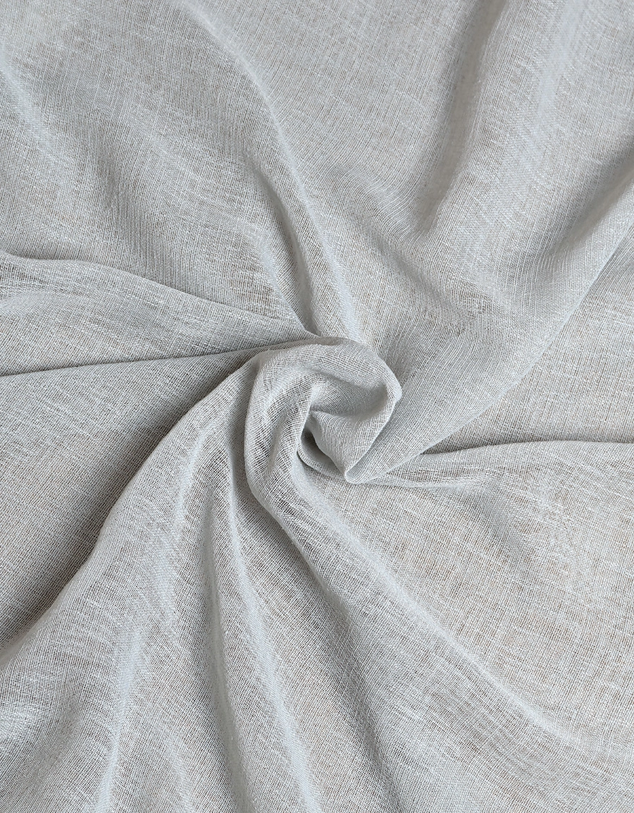 Närbild på gardintyg Malva, blå