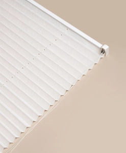 Avskärmande plisségardin