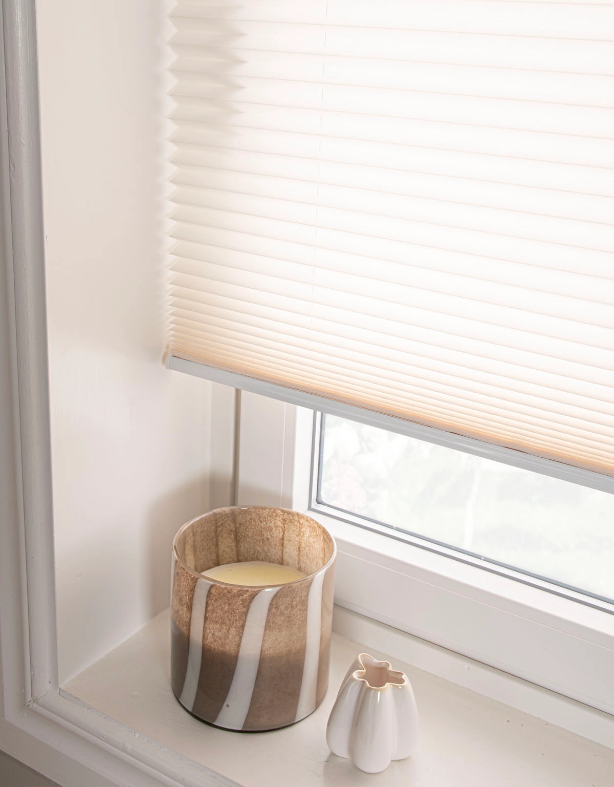 Avskärmande plisségardin