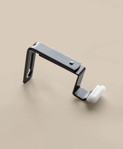 Svart väggfäste till gardinskena Alu Dream