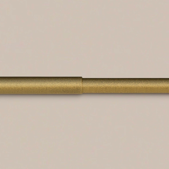 Gardinstång i guldnougat