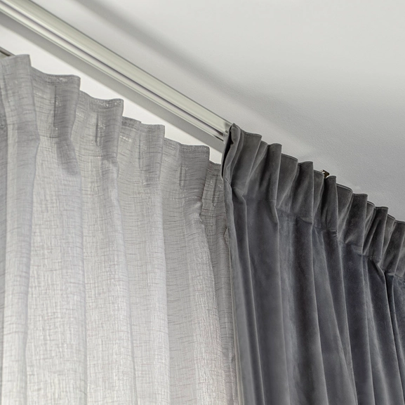 Curtain rail with double curtains