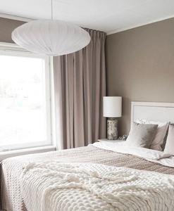 Beige mörkläggningsgardin