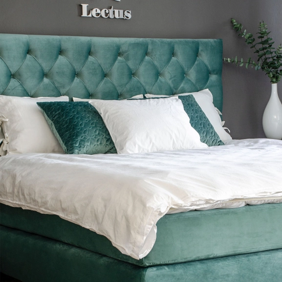 Sänggavel i grön sammet