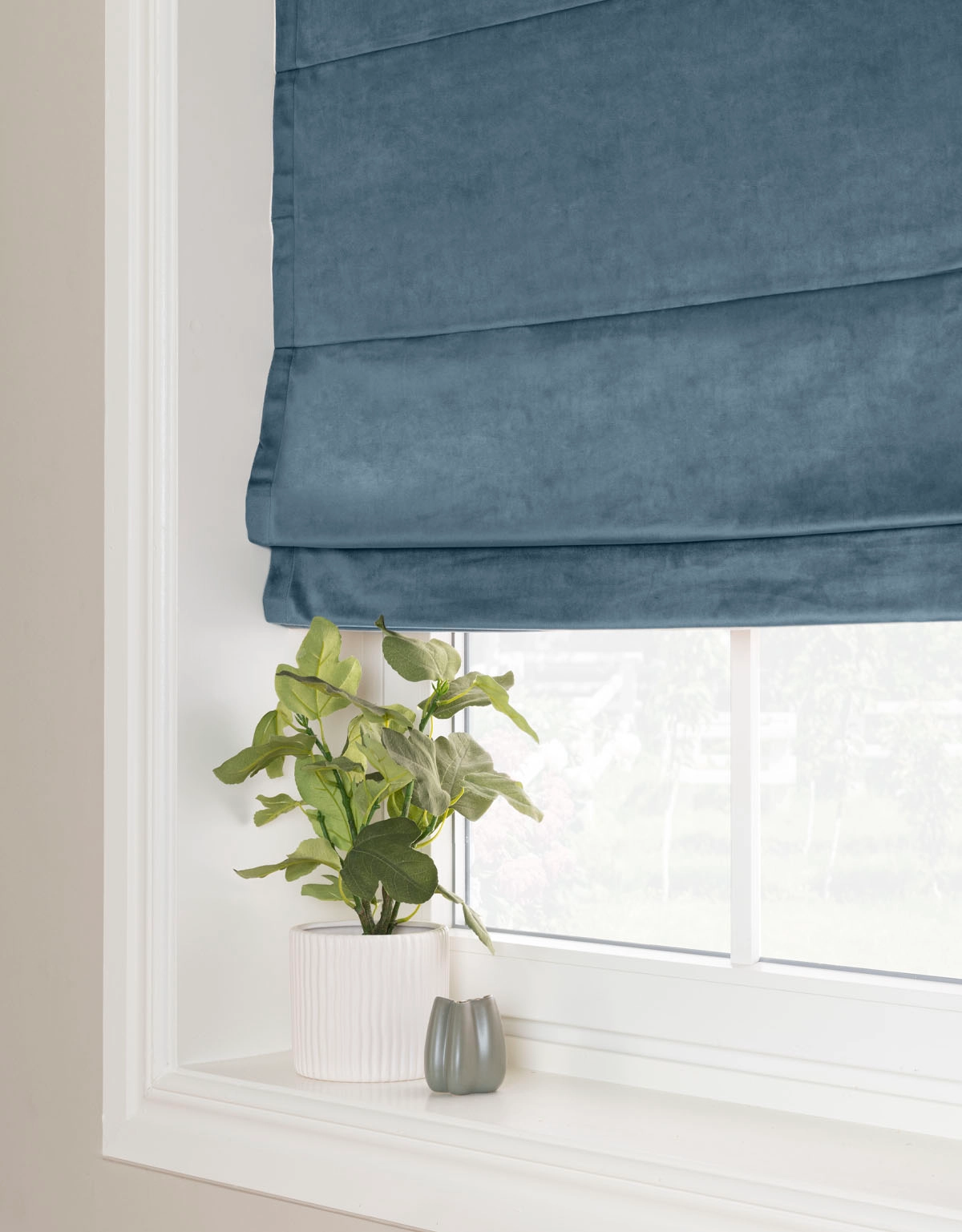 Blå hissgardin i sammet