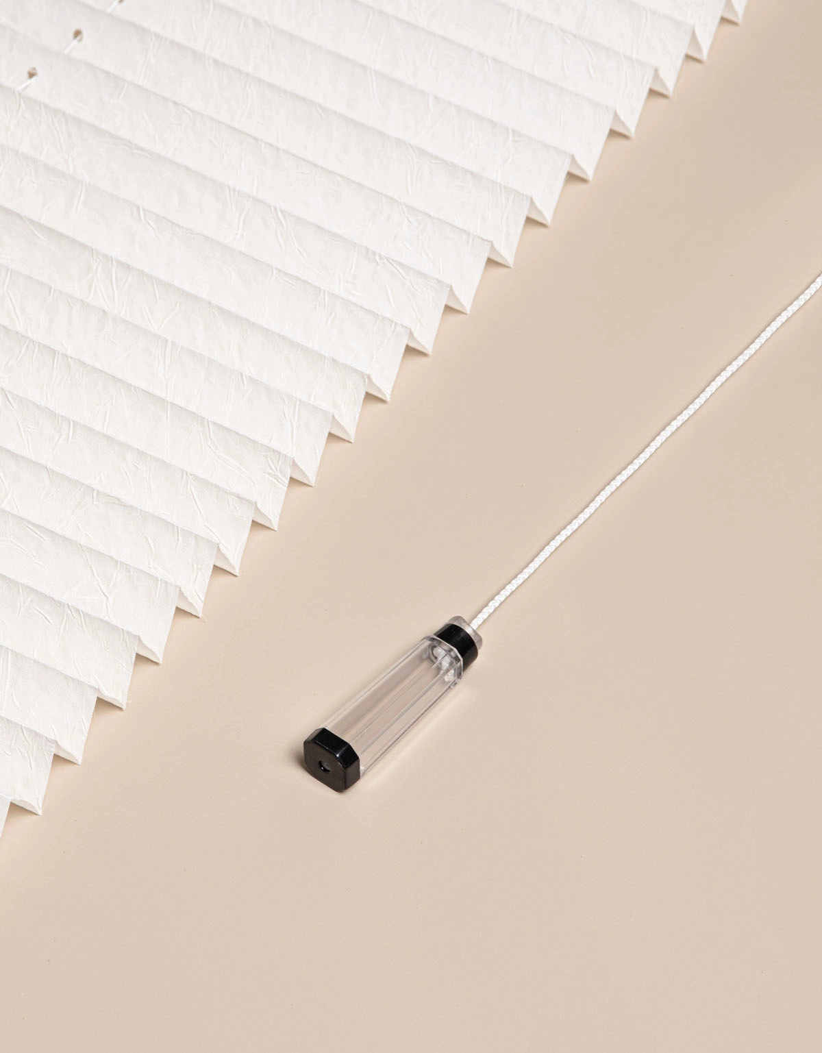 Justeringlina till plisségardin