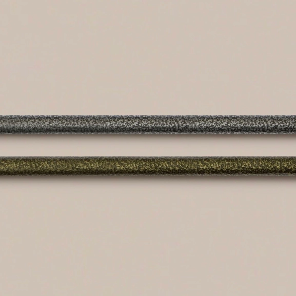 Gardinstång i svartsilver och svartguld