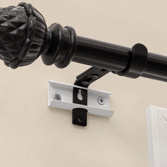 Väggbeslag för gardinstång