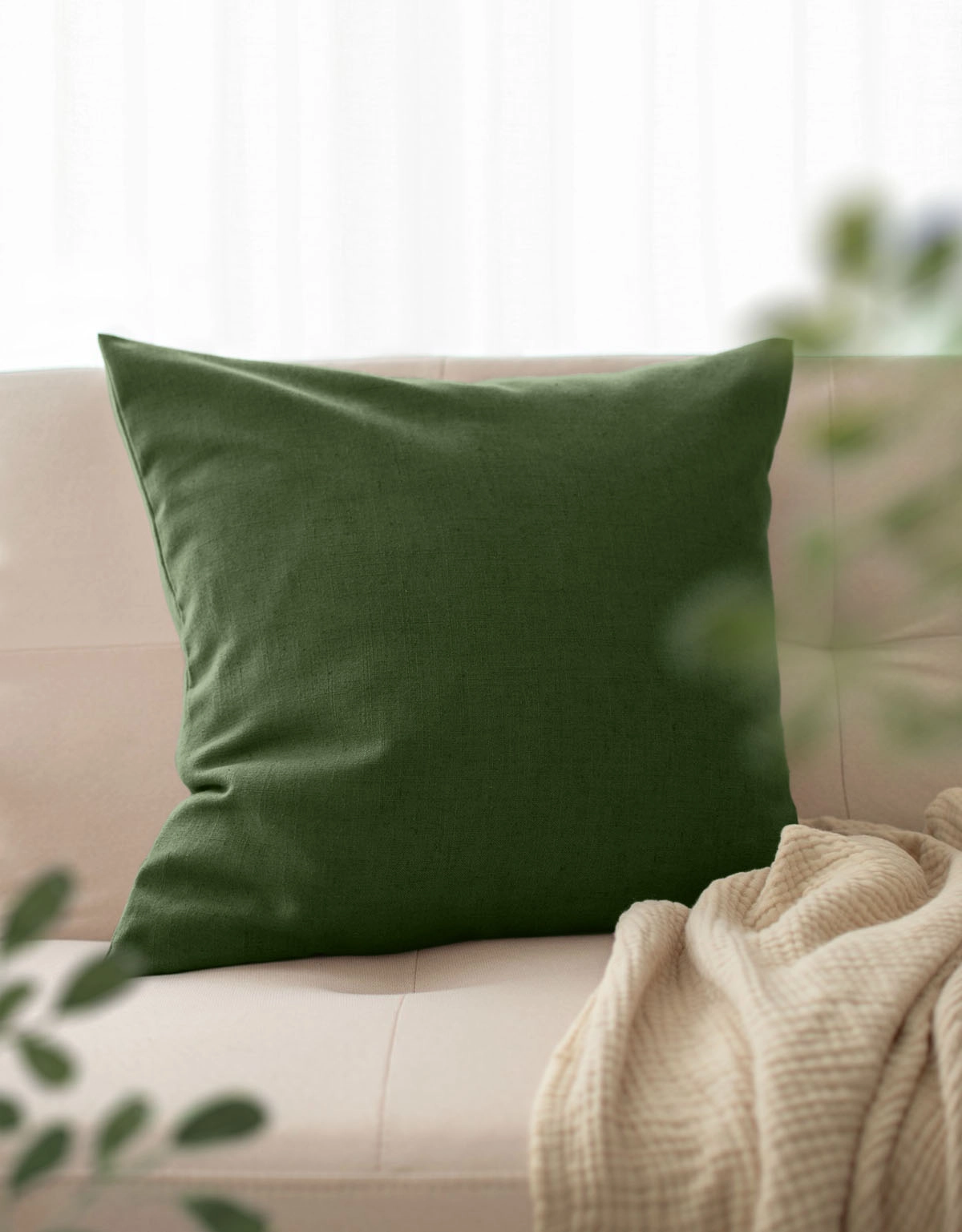Mörkgrön kuddfodral i linneblandning