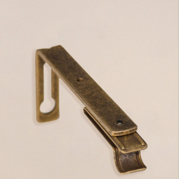 Väggfäste till gardinstång i antikmässing
