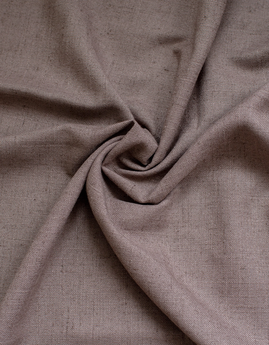 Närbild på gardintyg Lina i brunt