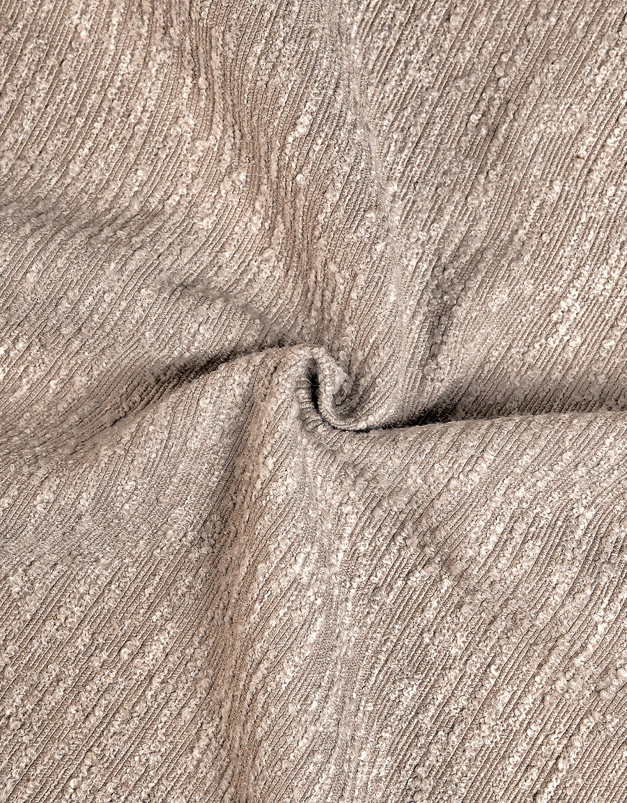 Närbild boucletyg, taupe