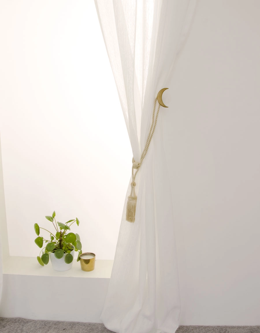 Omtagsfäste Måne i mässing Hasta