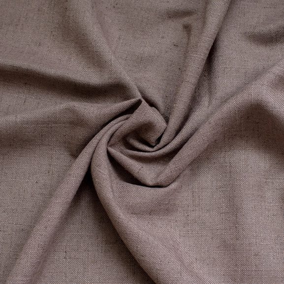 Närbild på gardintyg Lina i brunt