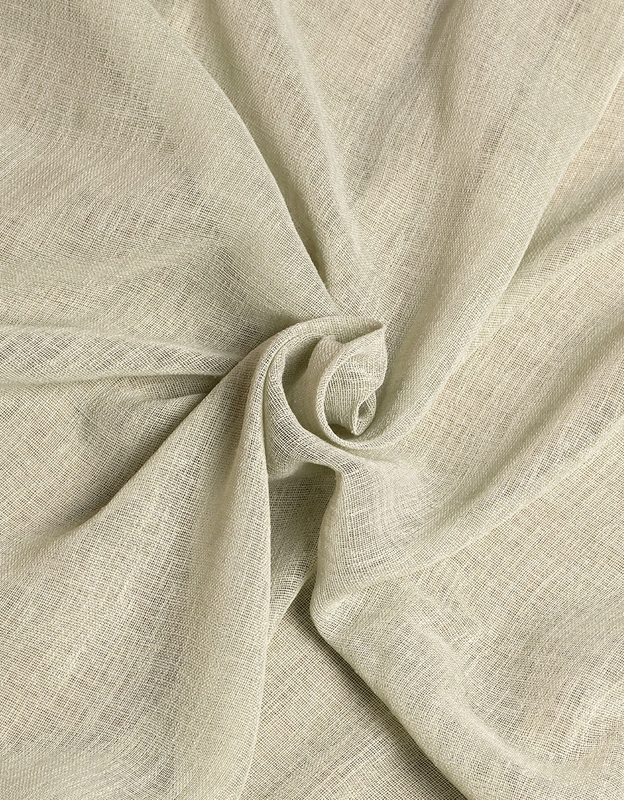 Närbild på gardintyg Malva, grön