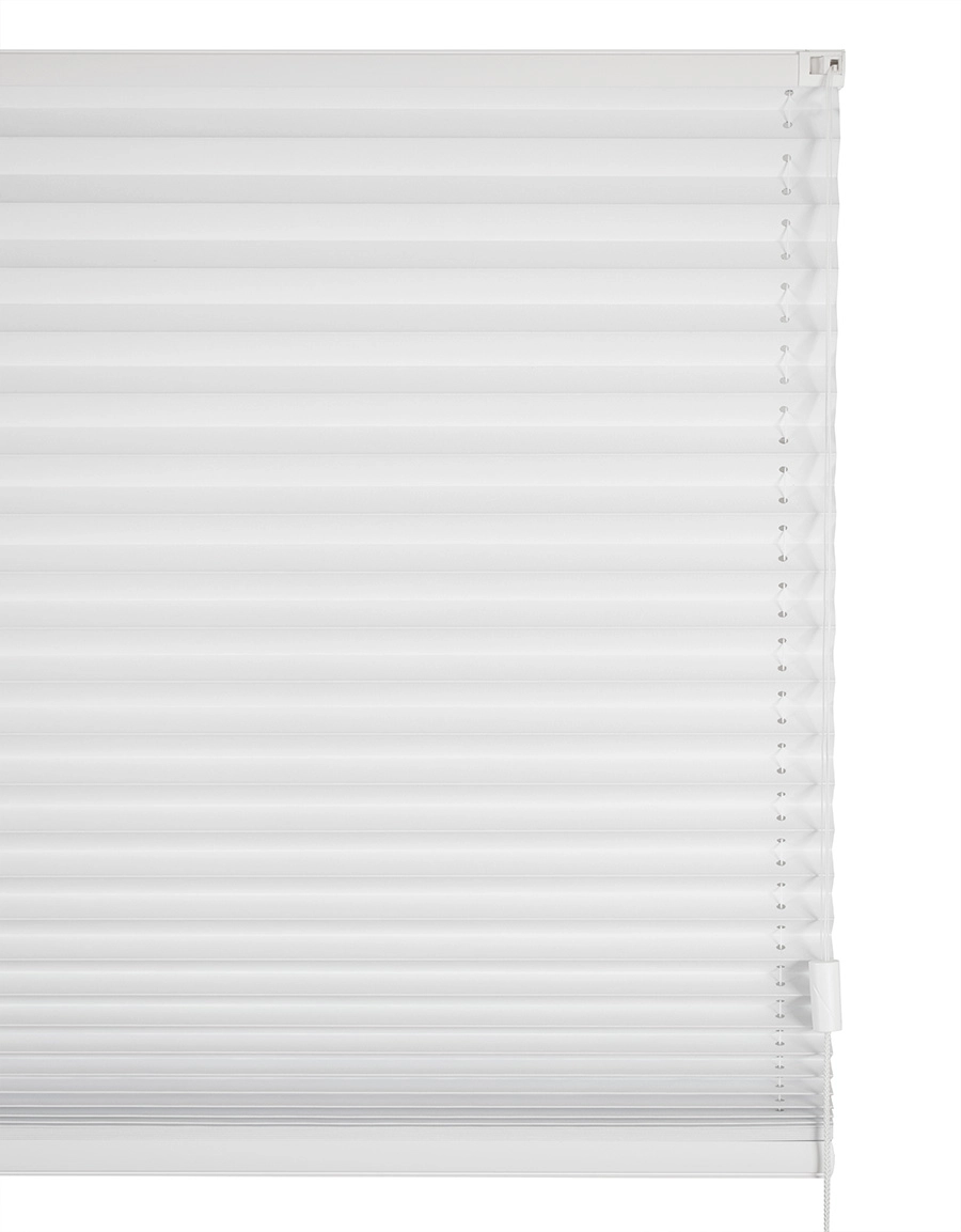 Närbild på mörkläggande plisségardin